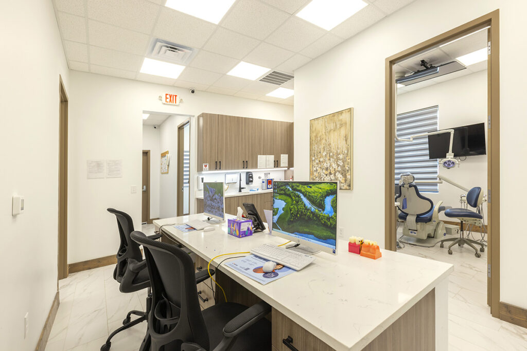 Front desk and treatment room at Shape Dental in Georgetown, TX